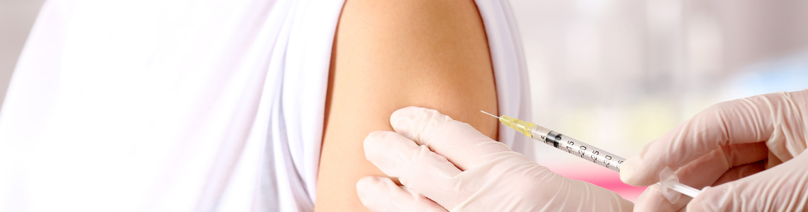 patient receiving vaccine in arm